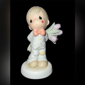Precious Moments For The Sweetest Tu-Lips in Town Figurine.